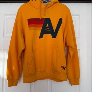 AVIATOR NATION | LOGO PULLOVER RELAXED HOODIE - GOLD SMALL